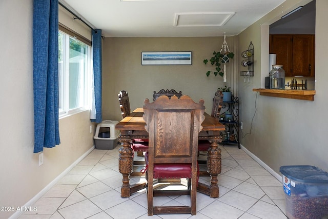 dining room featuring light tile patterned floors