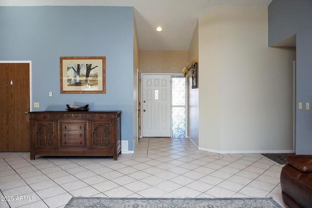 entrance foyer with light tile patterned flooring