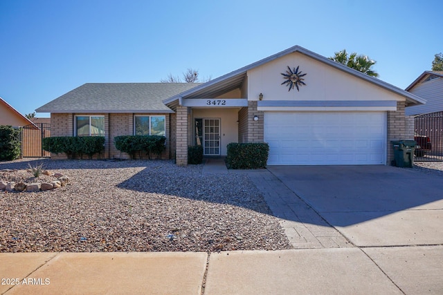 ranch-style home with a garage