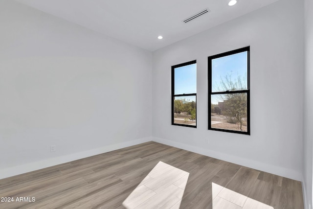 empty room featuring light hardwood / wood-style floors