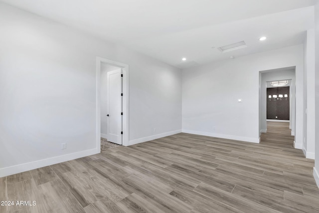 empty room with light wood-type flooring