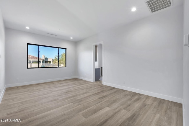 unfurnished room featuring light wood-type flooring