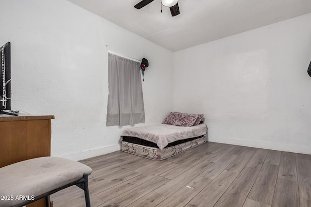 3913 W Sherman St, Phoenix, AZ 85009 - bedroom featuring wood finished floors, baseboards, and ceiling fan