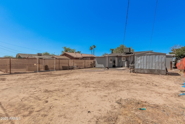 3913 W Sherman St, Phoenix, AZ 85009 - rear view of house featuring central AC