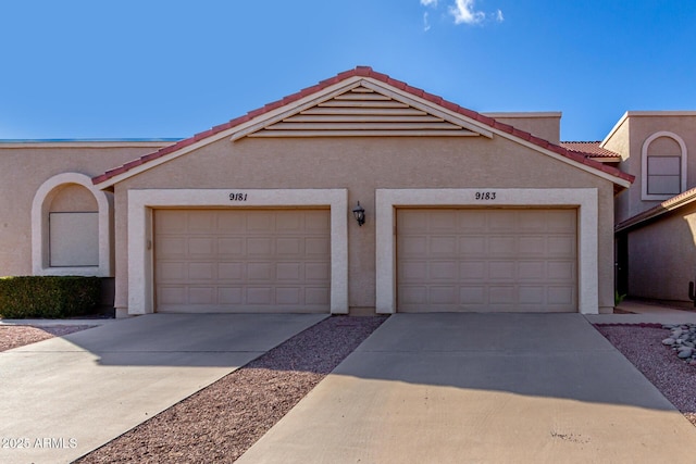 view of front of property featuring a garage