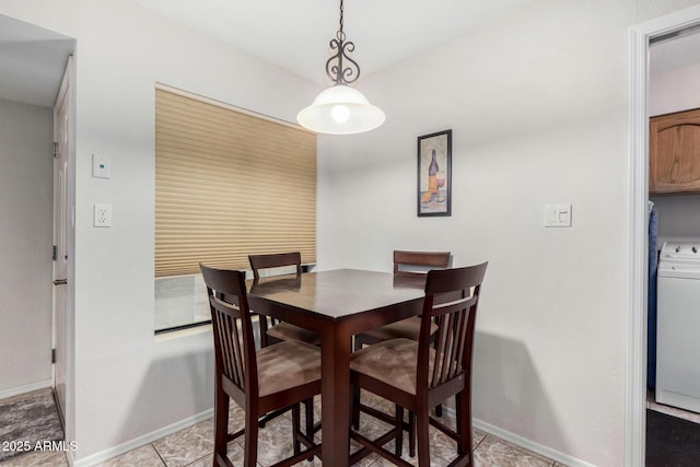 dining room featuring washer / dryer