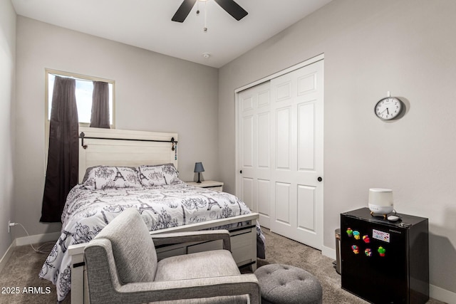 18139 W Oregon Ct, Litchfield Park, AZ 85340 - carpeted bedroom with baseboards, a closet, and a ceiling fan