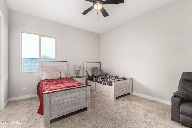 18139 W Oregon Ct, Litchfield Park, AZ 85340 - bedroom with carpet floors, baseboards, and a ceiling fan