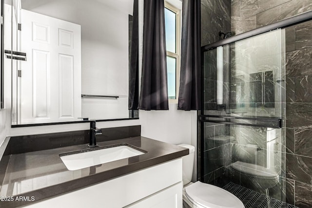18139 W Oregon Ct, Litchfield Park, AZ 85340 - bathroom featuring toilet, vanity, and a shower stall
