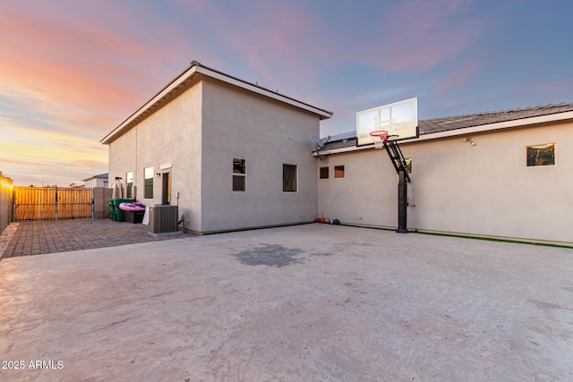 18139 W Oregon Ct, Litchfield Park, AZ 85340 - back of house featuring stucco siding and central AC