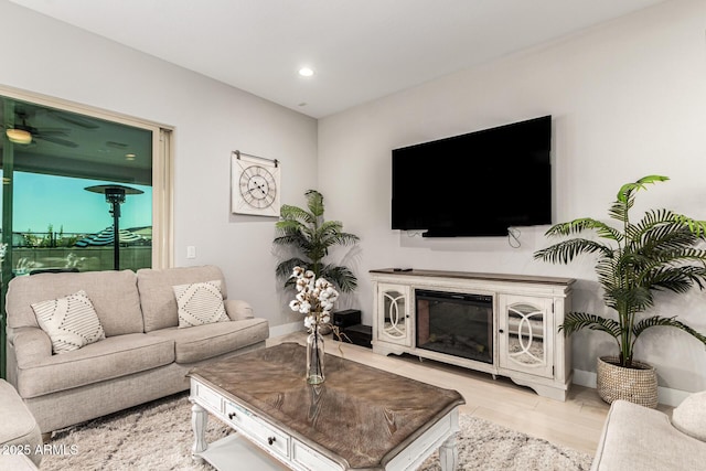 18139 W Oregon Ct, Litchfield Park, AZ 85340 - living area featuring a ceiling fan, wood finished floors, baseboards, and recessed lighting