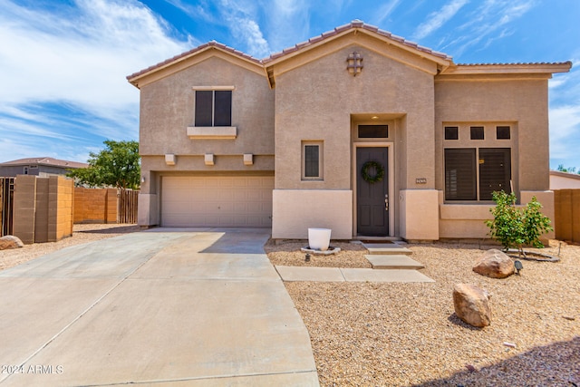 view of front of property featuring a garage