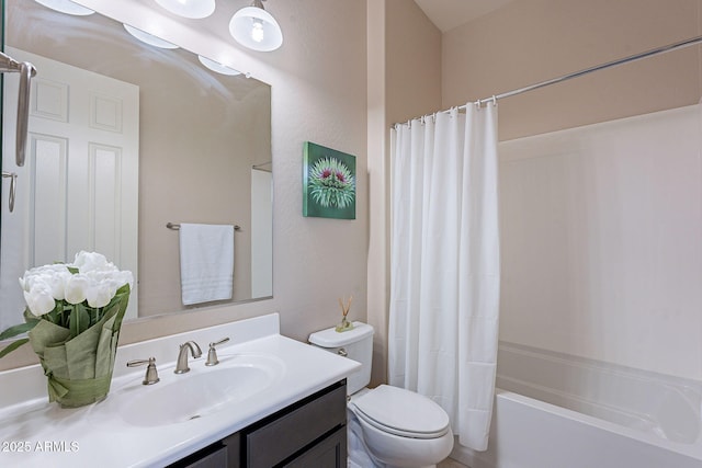 full bathroom featuring vanity, shower / bath combination with curtain, and toilet