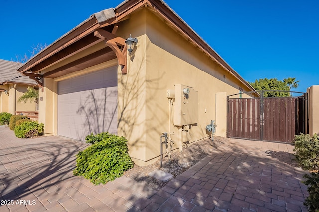 view of property exterior with a garage