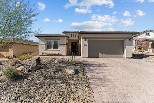 prairie-style home with a garage