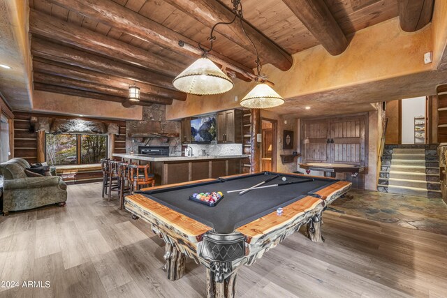 playroom featuring light wood-type flooring, billiards, beam ceiling, and wooden ceiling