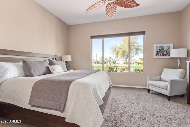 carpeted bedroom with baseboards