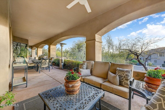 view of patio / terrace with ceiling fan and outdoor lounge area