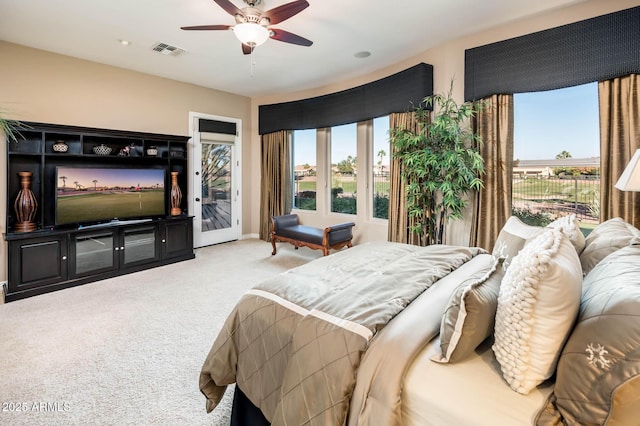 bedroom with ceiling fan, access to exterior, and light colored carpet