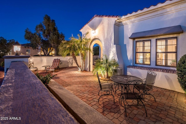 view of patio at night