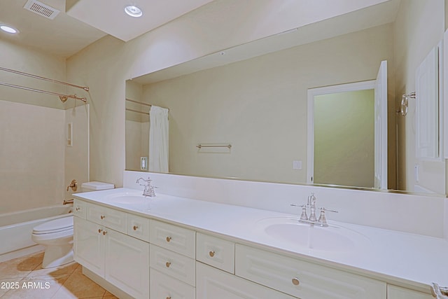 full bath featuring tile patterned floors, visible vents, toilet, and a sink