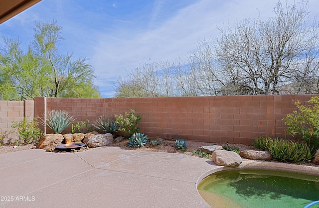 view of patio with a fenced backyard