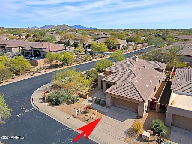 aerial view featuring a residential view and a mountain view