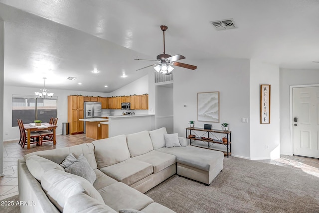 living room featuring visible vents, recessed lighting, vaulted ceiling, ceiling fan with notable chandelier, and light colored carpet