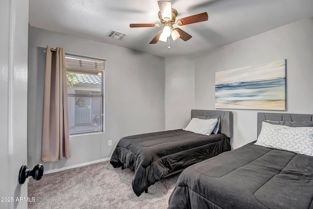 bedroom with visible vents, carpet flooring, baseboards, and ceiling fan