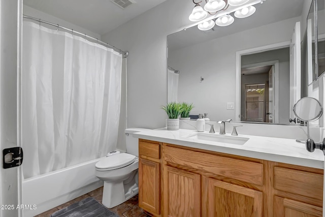 full bathroom with shower / bath combination with curtain, visible vents, toilet, and vanity