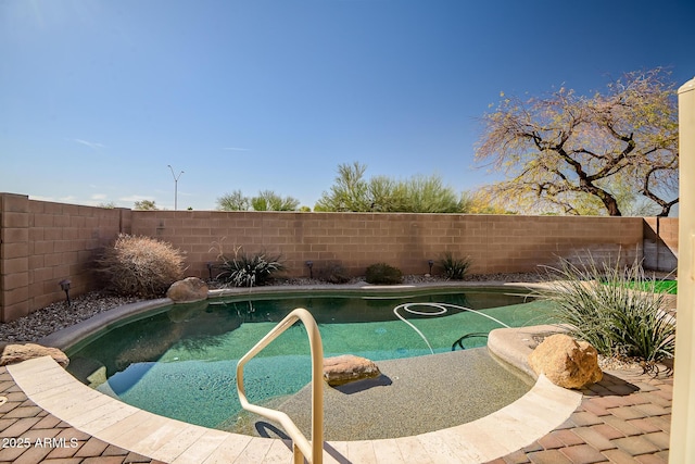 view of pool with a fenced in pool and a fenced backyard