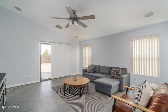 2889 S 161st Dr, Goodyear, AZ 85338 - living area featuring wood finished floors, baseboards, visible vents, lofted ceiling, and ceiling fan