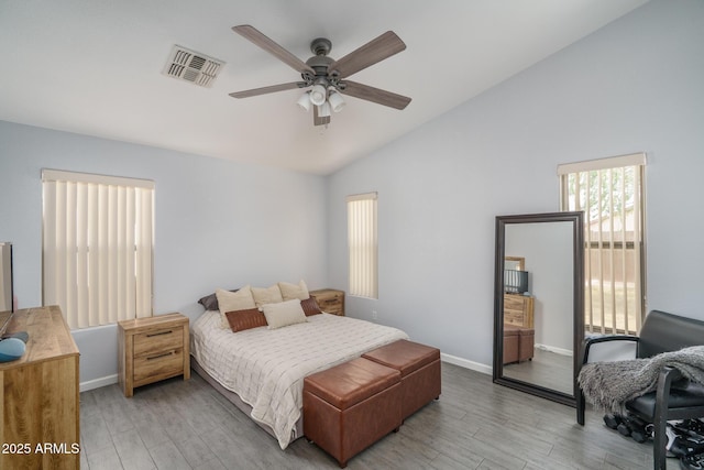2889 S 161st Dr, Goodyear, AZ 85338 - bedroom featuring visible vents, a ceiling fan, light wood-style floors, and lofted ceiling