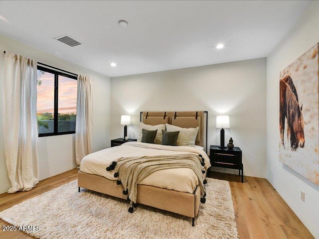 bedroom featuring light wood-type flooring