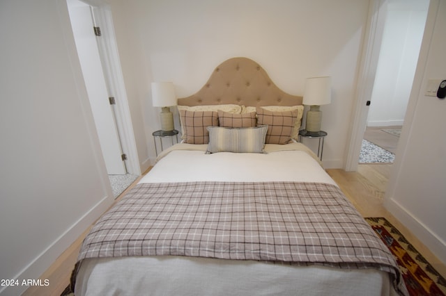 bedroom featuring light hardwood / wood-style floors