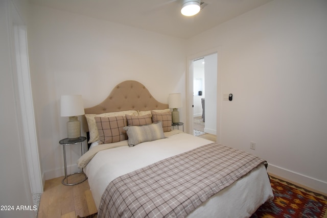 bedroom with light wood-type flooring