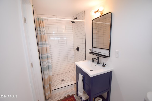 bathroom featuring vanity, toilet, tile patterned floors, and a shower with shower curtain