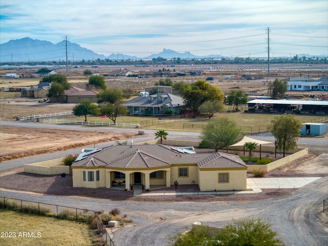 drone / aerial view featuring a mountain view