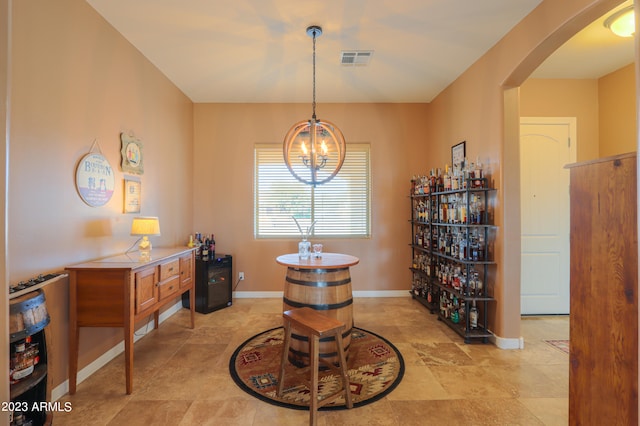 dining space featuring a chandelier