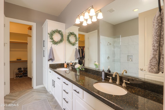 bathroom featuring vanity and walk in shower