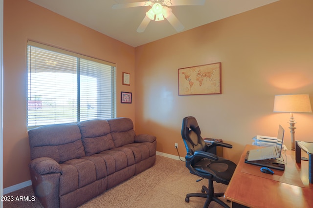 carpeted office with ceiling fan