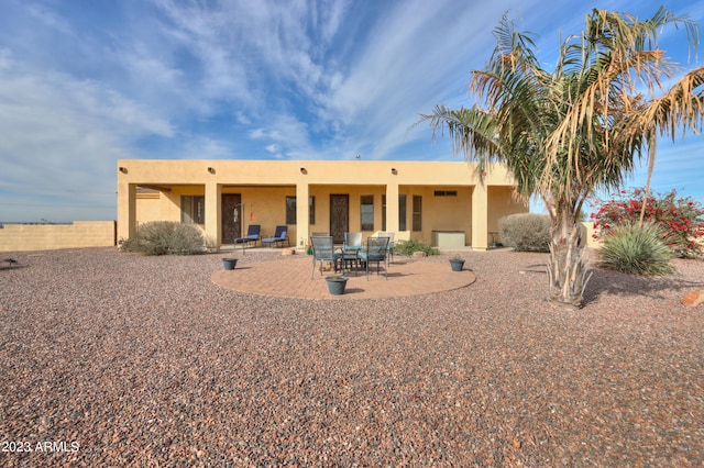 rear view of house with a patio area