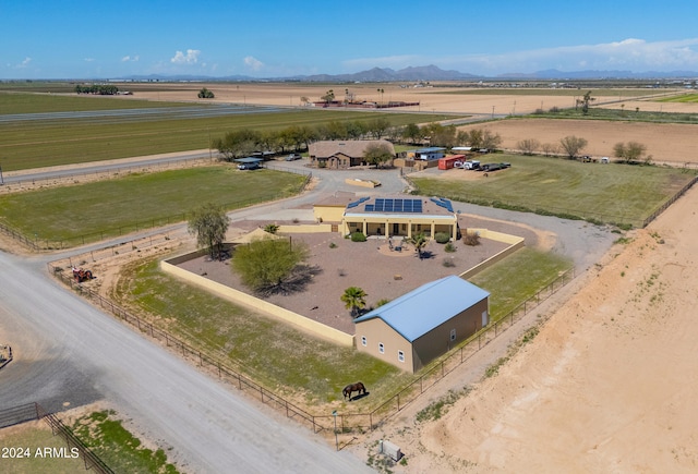 bird's eye view featuring a mountain view and a rural view