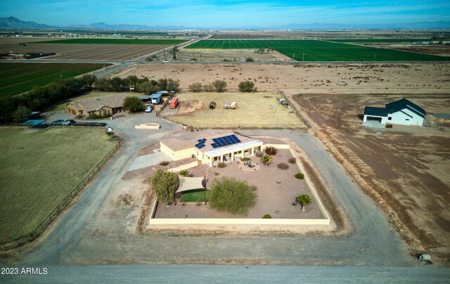 aerial view with a mountain view and a rural view