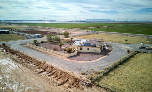 birds eye view of property featuring a rural view