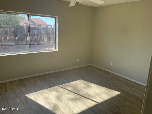 unfurnished room featuring wood-type flooring and ceiling fan