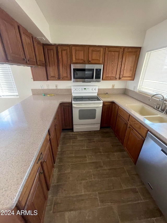 kitchen featuring stainless steel appliances and sink