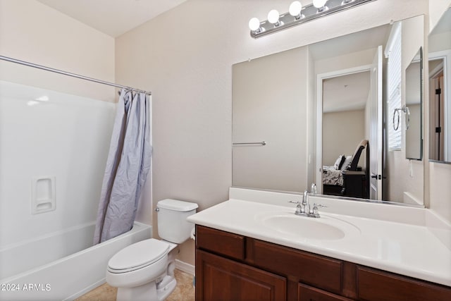 full bathroom featuring vanity, shower / tub combo, toilet, and tile patterned flooring