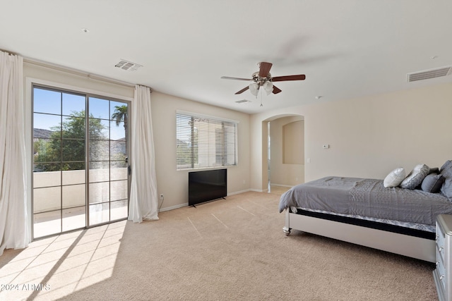 carpeted bedroom with access to outside and ceiling fan