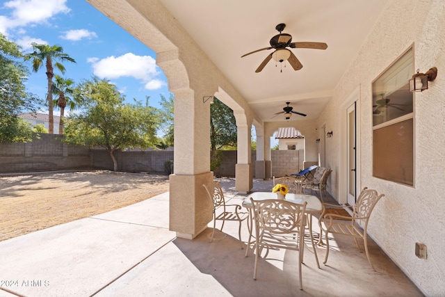 view of patio / terrace featuring ceiling fan